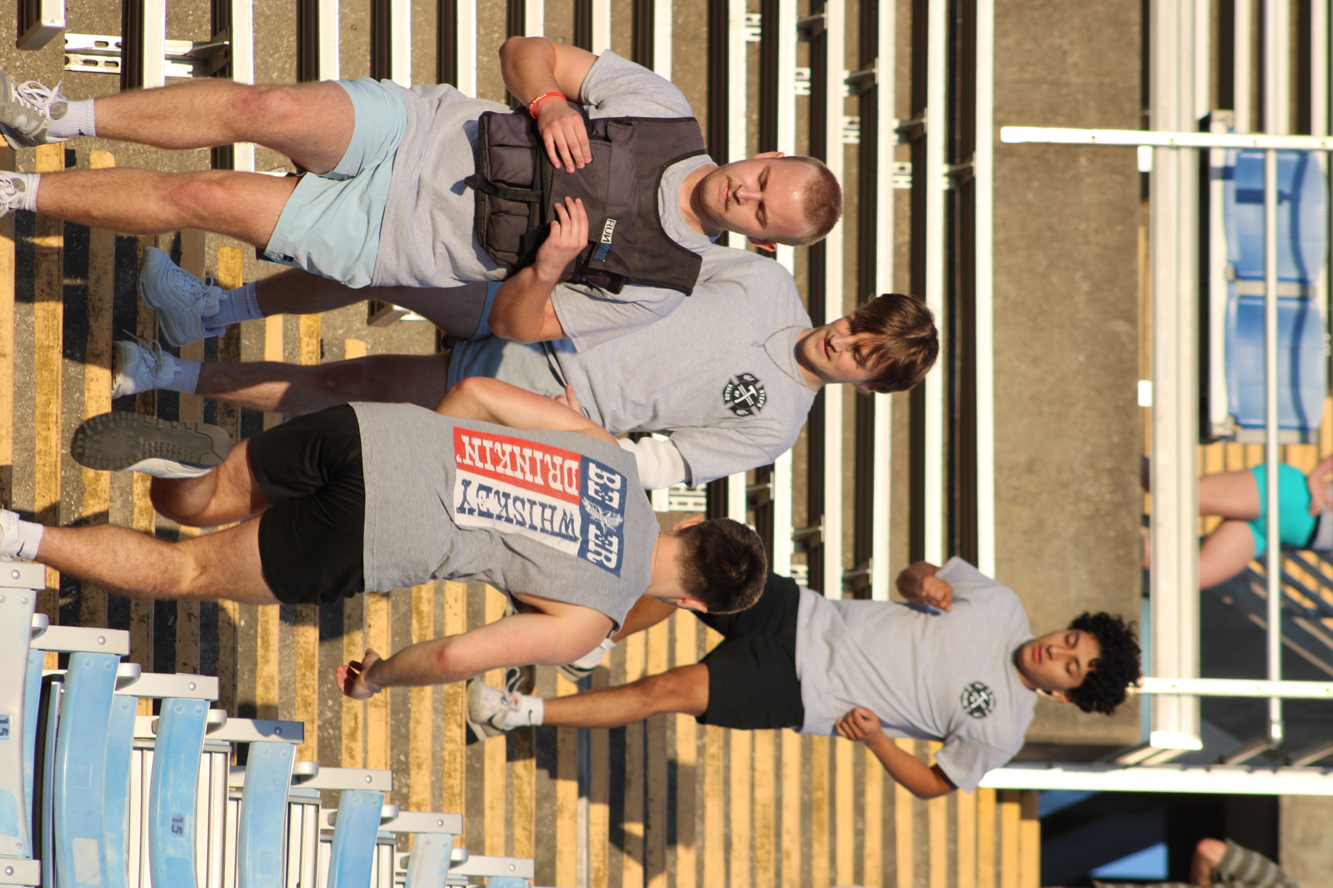 Participants climbing stadium stairs