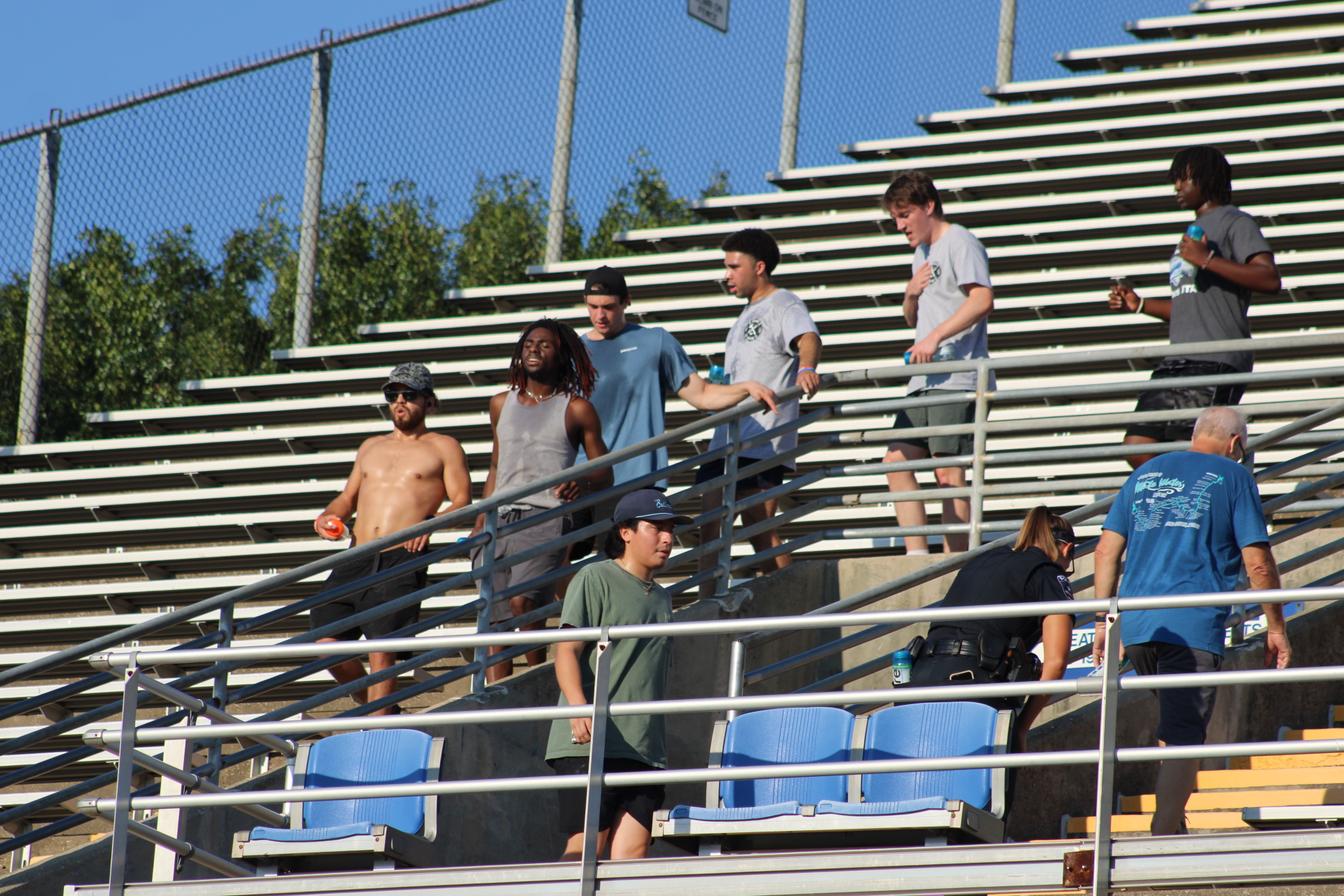 Climbers spread across stadium bleachers
